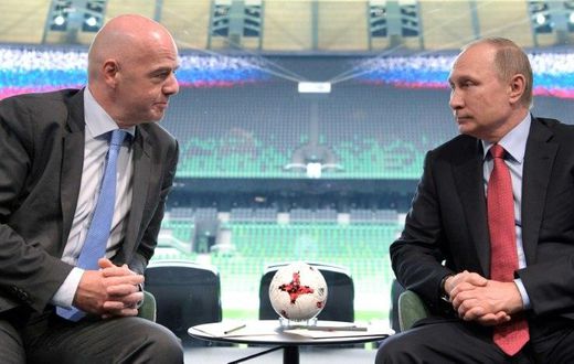 Russian President Vladimir Putin (right) meets with FIFA chief Gianni Infantino at the FC Krasnodar Stadium on May 23, 2017