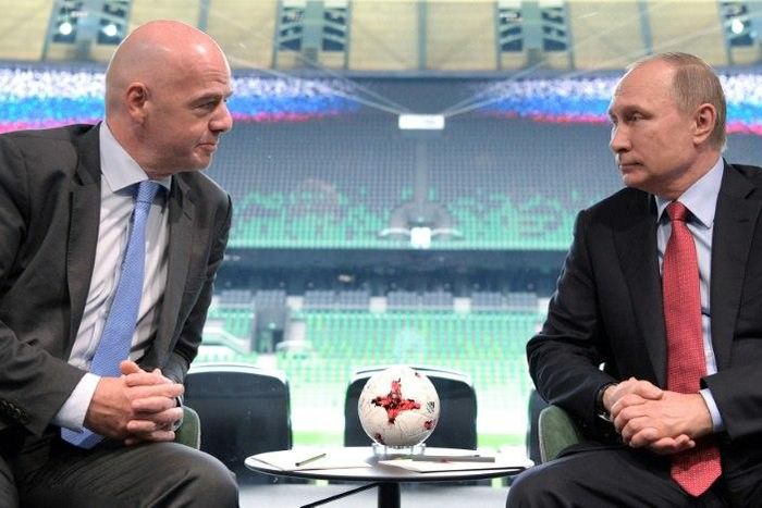 Russian President Vladimir Putin (right) meets with FIFA chief Gianni Infantino at the FC Krasnodar Stadium on May 23, 2017