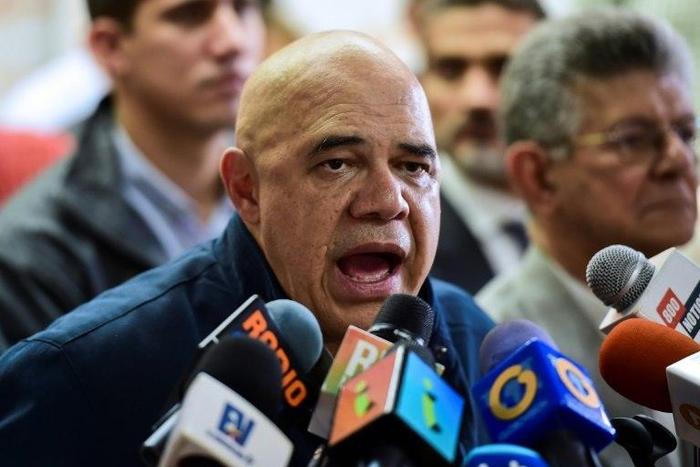 Jesus Torrealba, secretary general of the main opposition coalition, the Democratic Unity Roundtable (MUD), speaks during a press conference in Caracas on November 2, 2016