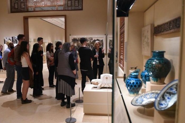 Curators at the Metropolitan Museum of Art talk to visitors about works created in the lands that are now Iraq, Syria, Iran and Yemen, four of the seven countries affected by the recent travel ban
