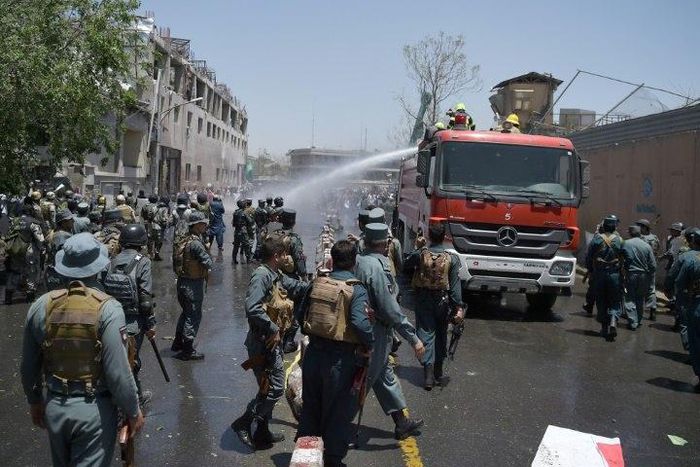 Hundreds of demonstrators calling for President Ashraf Ghani to step down and chanting "Death to the Taliban" clashed with police near the bombing site, prompting officials to respond with live rounds, tear gas and water cannon