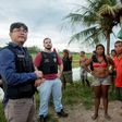 Handout picture released by the Indigenous Missionary Council (CIMI) showing police officers (L) talking to Gamela indigenous people after a farmers attack in Viana, Maranhao state, north of Brazil on May 1, 2017