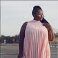 Jerza M is a plus size model and a fashion blogger.