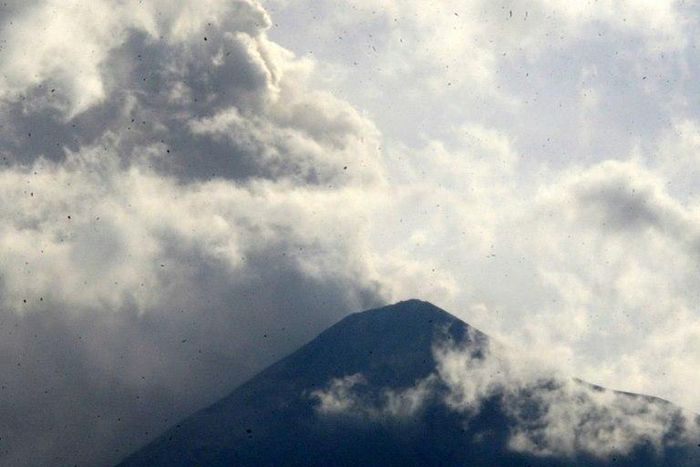 The Volcano of Fire is seen from Alotenango municipality, Sacatepequez department, about 30 km southwest of Guatemala City, as it erupts on May 5, 2017