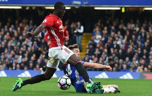 Manchester United's defender Eric Bailly collides with Chelsea's defender Gary Cahill on October 23, 2016
