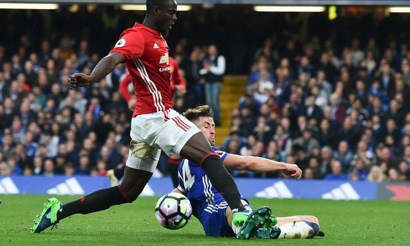 Manchester United's defender Eric Bailly collides with Chelsea's defender Gary Cahill on October 23, 2016