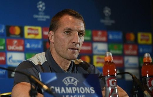 Celtic's Northern Irish manager Brendan Rodgers' side set a new Scottish top-flight record as the earliest ever champions after wrapping it up with eight games remaining