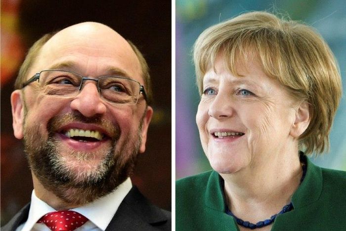 Social Democratic leader Martin Schulz (left) has failed to maintain his party's hold on North Rhine-Westphalia against Chancellor Angela Merkel's CDU