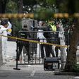 Colombian anti-explosive police inspect the site where a bomb exploded near the La Macarena bullring in downtown Bogota, Colombia, on February 19, 2017