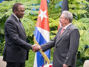 President Uhuru Kenyatta shakes hands with Cuban President Raul Castro in Cuba on March 15, 2019