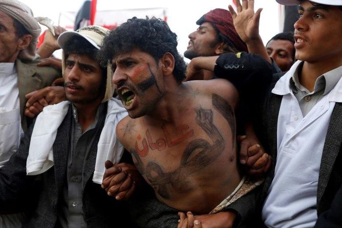 Yemeni supporters of the Huthi movement and former president Ali Abdullah Saleh at a rally to mark two years of the military intervention by the Saudi-led coalition, in the capital Sanaa on March 26, 2017