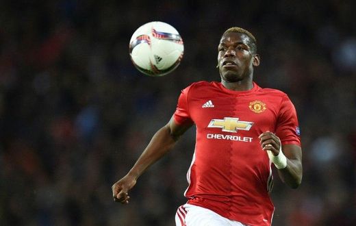 Manchester United's French midfielder Paul Pogba chases the ball during the UEFA Europa League quarter-final match between Manchester United and Anderlecht at Old Trafford in Manchester on April 20, 2017
