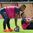 Chile forwards Arturo Vidal (left) and Alexis Sanchez stretch during a 2014 training session in Belo Horizonte