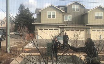 White officer placed on leave after detaining black man picking up trash in front of his building