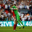 Arsenal's goalkeeper David Ospina and defender Per Mertesacker celebrate their win on the final whistle of their English FA Cup final against Chelsea at Wembley stadium in London on May 27, 2017