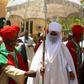 The Emir of Kano Muhammadu Sanusi II (centre) faces allegations of embezzlement, abuse of office and improper conduct