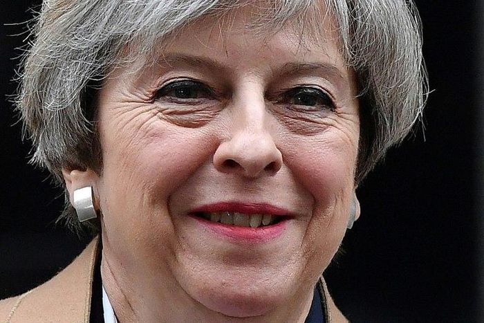 British Prime Minister Theresa May leaves 10 Downing Street to head to the Houses of Parliament in central London on March 29, 2017