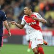 Monaco's Kylian Mbappe (R) celebrates after scoring a goal during their match against Bordeaux (GB) on March 11, 2017 in Monaco