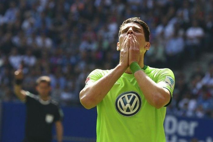 "Football is brutal," said Wolfsburg's forward Mario Gomez