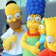 "The Simpsons", consisting of Homer (2nd L), Marge, Maggie (C), Bart and Lisa (2nd R), will return for its 29th and 30th seasons, breaking the record for most episodes previously held by Western drama "Gunsmoke"
