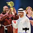 Shaikh Hamdan presents the Best teacher award to Peter Tabichi, a Maths and Physics teacher from Kenya, as Sunny Varkey, founder of the GESF, looks on. (Gulf News)
