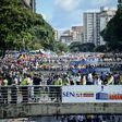 Opponents of Venezuelan President Nicolas Maduro hold a demostration in Caracas on January 23, 2017