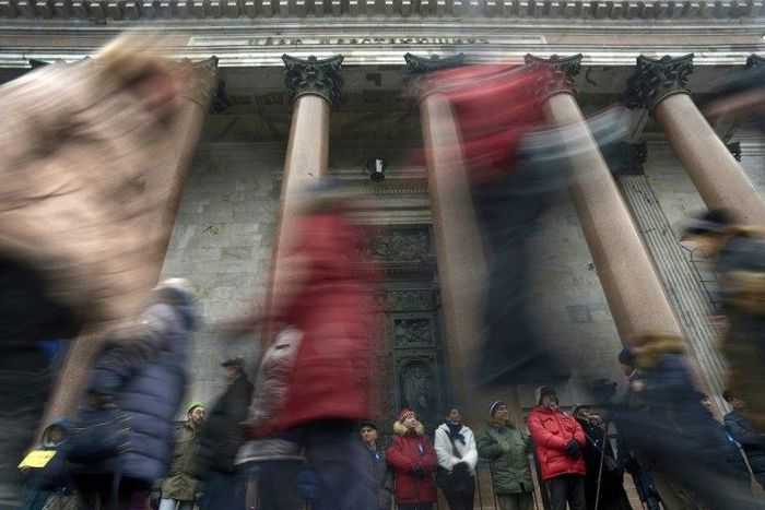 People take part in a rally in front of the St Isaac's Cathedral in Saint Petersburg, Russia on February 12, 2017 to protest against the city authorities' decision to hand control of the building to the powerful Russian Orthodox Church