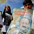 Palestinians hold portraits of Palestinian leader and prominent prisoner Marwan Barghouti, during a rally in the West Bank city of Ramallah in support of prisoners on hunger strike in Israeli jails on April 24, 2017
