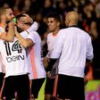 Valencia's players celebrates after their Spanish league football match against Real Madrid at the Mestalla stadium in Valencia on February 22, 2017
