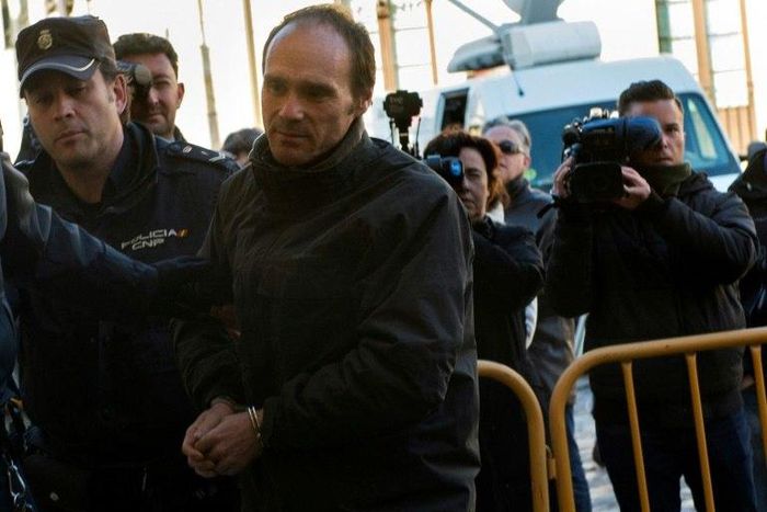 Miguel Angel Munoz (C) arrives at the provincial court of Leon, north of Spain, to be tried for the murder of a US tourist in 2015, on March 14, 2017