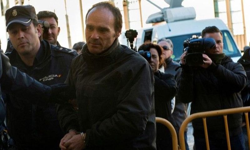 Miguel Angel Munoz (C) arrives at the provincial court of Leon, north of Spain, to be tried for the murder of a US tourist in 2015, on March 14, 2017