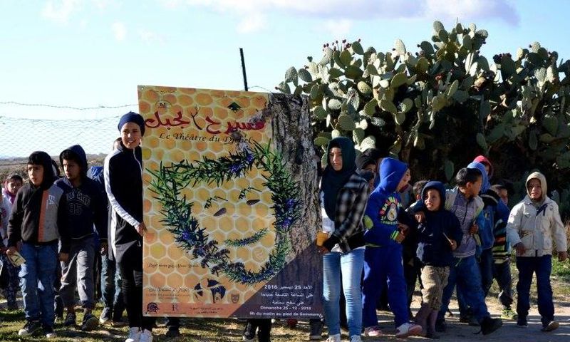 Tunisian children perform on Mount Sammama, as part of a project by the Jabal Theatre to use traditional culture and drama to combat the appeal of jihadist ideology