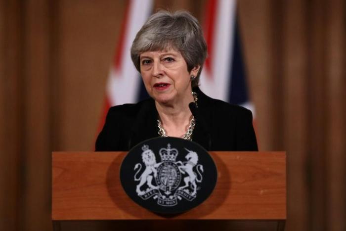 Britain's Prime Minister Theresa May offered to work with opposition Labour leader Jeremy Corbyn
