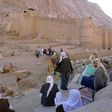 Egyptian Bedouins wait for tourists with their camels outside the walls of St Catherine monastery in the Sinai desert