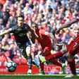 Liverpool's midfielder James Milner takes a penalty during the English Premier League football match between Liverpool and Southampton at Anfield in Liverpool, north west England on May 7, 2017