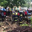 Rescuers pull bodies of people killed after a wall collapsed on a house in Mbaraki, Mombasa, May 8, 2017.