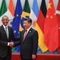 China's President Xi Jinping (R) shakes hands with US President Barack Obama before the G20 leaders' family photo in Hangzhou on September 4, 2016