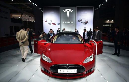 A Tesla Model S P85d on display at the 2015 Shanghai auto show. Electric vehicle sales have been government-subsidised partly to help reduce China's notorious air pollution, and the Chinese market is now the world's biggest and growing quickly