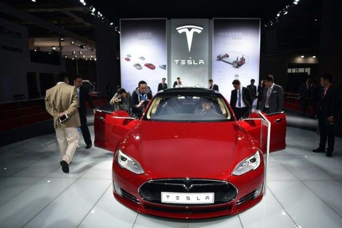 A Tesla Model S P85d on display at the 2015 Shanghai auto show. Electric vehicle sales have been government-subsidised partly to help reduce China's notorious air pollution, and the Chinese market is now the world's biggest and growing quickly
