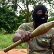 A mutinous soldier holds an RPG rocket launcher inside a military camp in Ivory Coast's second city Bouake, where the rebellion first erupted in January