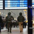 Special police commandos arrive at the main train station in Duesseldorf, western Germany, late on March 9, 2017 after at least nine people where injured by a man with an axe