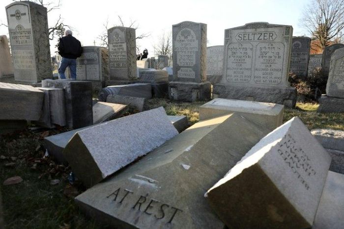 Vandalized tombstones are seen at the Jewish Mount Carmel Cemetery, February 26, 2017, in Philadelphia
