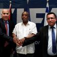 (L-R) Palestinian Football Association president Jibril Rajoub, South African official Tokyo Sexwale and president of the Israeli Football Federation, Ofer Eini are seen together in December 2015