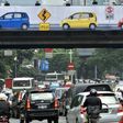 The X-rated clip was seen by motorists as they crawled along the major road in Jakarta