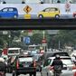 The X-rated clip was seen by motorists as they crawled along the major road in Jakarta
