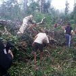 People search a remote area in Gleba Taquarucu do Norte, near Colniza, in the Brazilian state of Mato Grosso where at least 9 people were killed in an apparent land dispute, on April 21, 2017