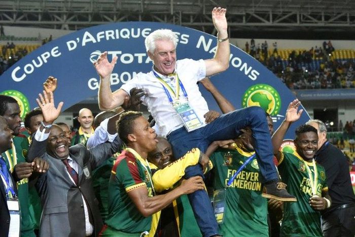Cameroon players lift Cameroon's Belgian coach Hugo Broos as the celebrate after beating Egypt 2-1 to win the 2017 Africa Cup of Nations final football match between Egypt and Cameroon on February 5, 2017