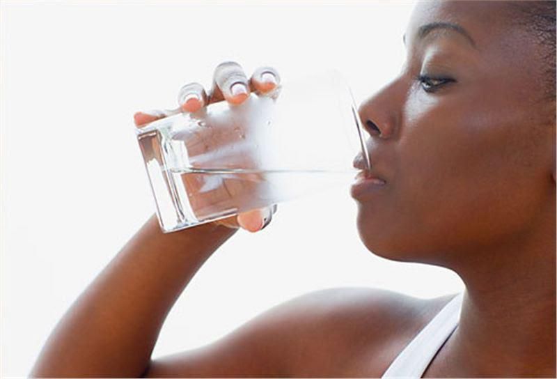 Woman drinking water(courtesy)