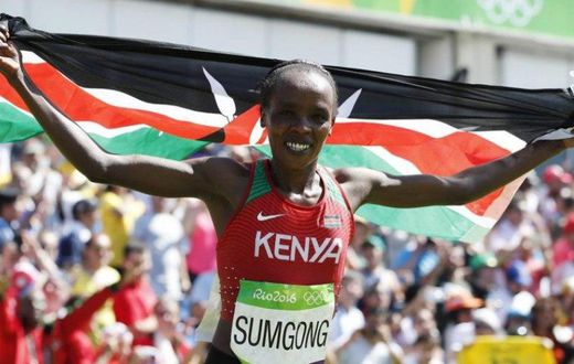 Jemima Jelagat Sumgong of Kenya celebrates after winning the women's marathon race at the 2016 Olympic Games in Rio de Janeiro, Brazil.