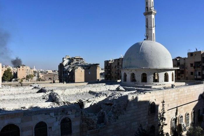 A picture taken on November 27, 2016 shows a damaged mosque in the Masaken Hanano district in eastern Aleppo, a day after Syrian pro-government forces reseized it from rebel fighters